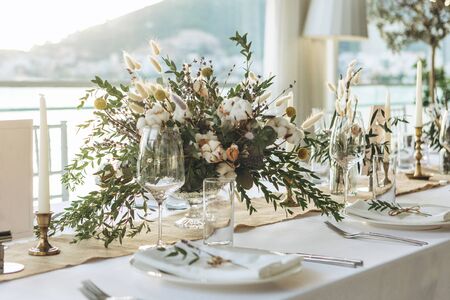 Table setting and decoration for a ceremony or celebration.の写真素材