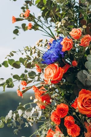Close-up of flowers including roses and carnations as decorations.の写真素材
