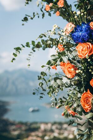 Close-up of flowers including roses as decorations.の写真素材