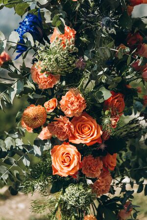 Close-up of flowers including roses and carnations as decorations.の写真素材