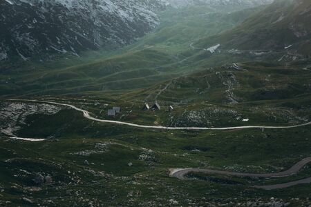 View of the natural landscape and tiny authentic houses in the highlands of Montenegro.の写真素材