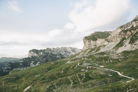 View of the natural landscape and tiny authentic houses in the highlands of Montenegro.の写真素材