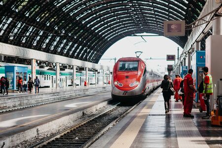 Italy, Milan, July 12, 2019: High-speed modern commuter train at the railway station in Milan.のeditorial素材
