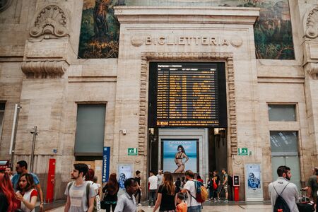 Italy, Milan, July 12, 2019: View of the interior and a lot of people at the train station in Milan.のeditorial素材