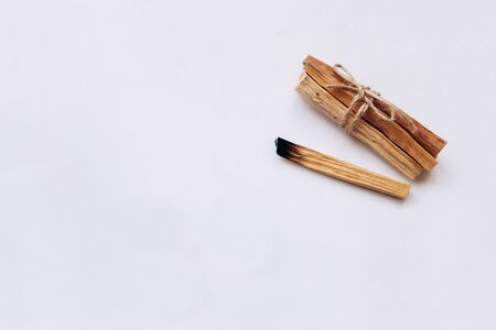 Palo Santo sticks on a white background. They are used in aromatherapy and religious rites and meditations.の写真素材