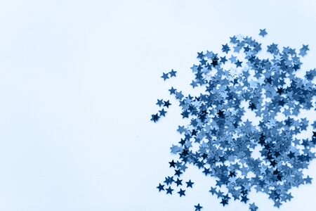 Abstract glowing stars background in classic blue color.の写真素材