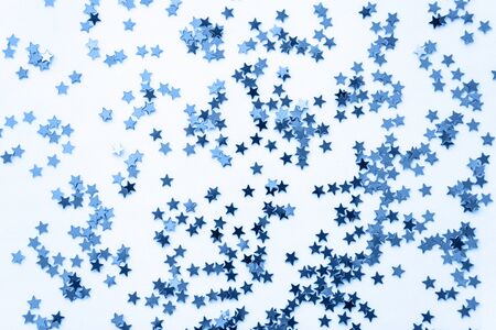 Abstract glowing stars background in classic blue color.の写真素材