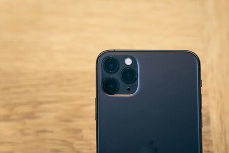 Turkey, Istanbul, December 17, 2019: Close-up rear view of the three cameras of the modern new iPhone 11 pro max.のeditorial素材