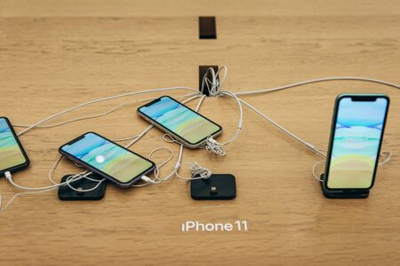 Turkey, Istanbul, December 17, 2019: Lots of the latest modern iPhones 11 at the Apple Store.のeditorial素材