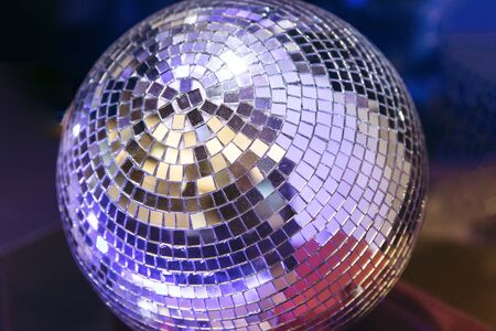 Mirrored glowing disco ball. Retro disco or decorationの写真素材