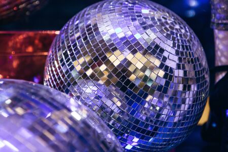 Mirrored glowing disco ball. Retro disco or decorationの写真素材