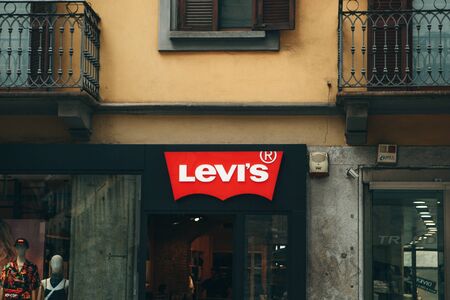 Italy, Milan, May 30, 2019: Livis company sign at the entrance to the store.のeditorial素材