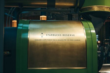 Italy, Milan, May 30, 2019: Side view coffee roasting equipment or coffee loading container at Starbucks Reserve in Milan.のeditorial素材
