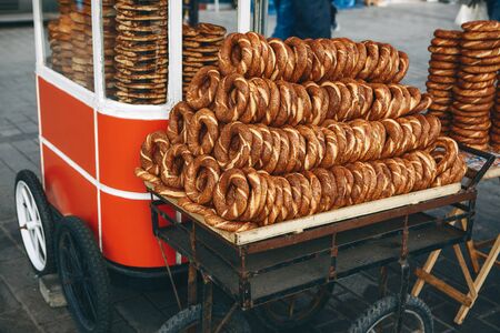 Selling traditional Turkish bagels called Simit. Traditional turkish food or snack.の写真素材