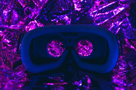 Virtual reality glasses on trendy gradient background. VR concept. Modern technologies.の写真素材