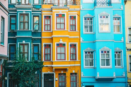 Ancient traditional apartment buildings in the Balat district of Istanbul in Turkey. The houses in...
