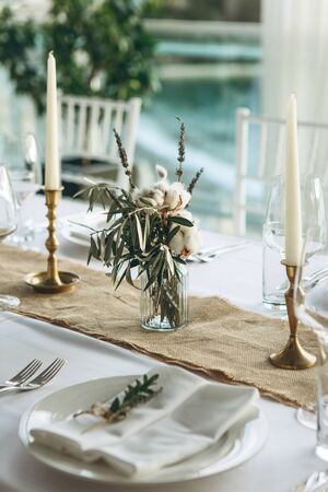 Table setting and decoration for a ceremony or celebration.の写真素材
