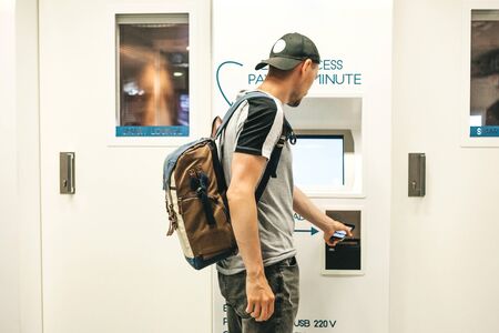 The tourist uses or pays for access to the self service lounge or the smart lounge at the airport to...