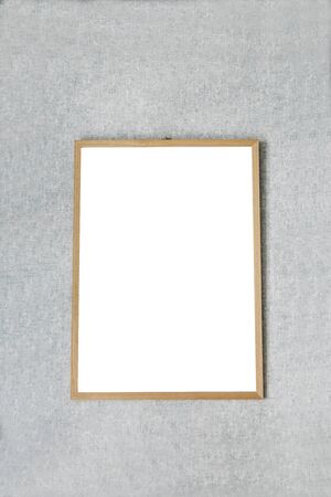 Mock up frame for a picture or photograph on a gray wall in Scandinavian style.の写真素材