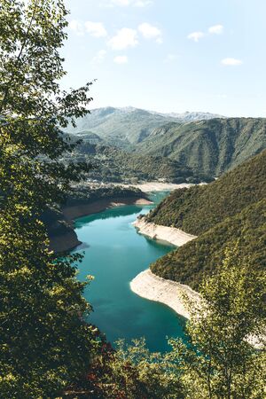 Beautiful view of the natural landscape in Montenegro. Piva reservoir with turquoise water.の写真素材