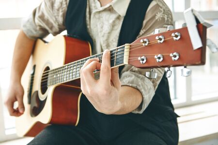 The guitarist plays the guitar. Or a person learns to play the guitar.