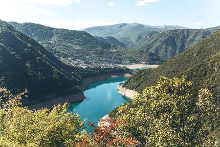 Beautiful view of the natural landscape in Montenegro. Piva reservoir with turquoise water.の写真素材