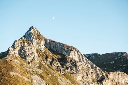 View of a beautiful natural mountain landscape against the blue sky in Montenegro in autumn.の写真素材