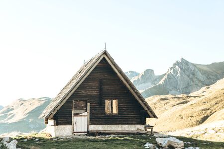 The traditional wooden summer house of shepherds in a mountainous area in the north of Montenegro is abandoned in the fall.の写真素材