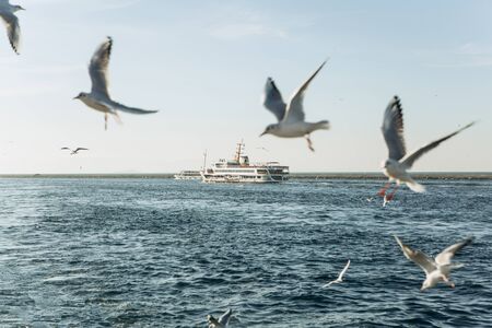 Passenger ship or ferry sailing along the Bosphorus in Istanbul in Turkeyの写真素材