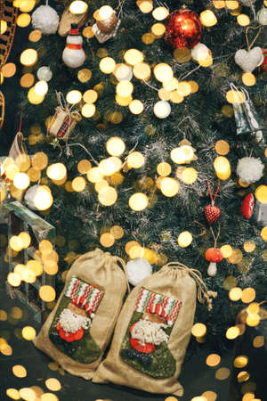 Decorated Christmas or New Year tree festive background.の写真素材
