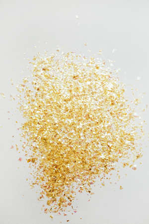 Beautiful festive white background with golden confetti.の写真素材