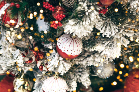 Decorated festive Christmas or New Year tree background.の写真素材