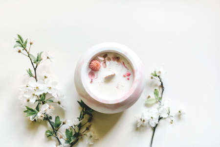 Soy or coconut candle with a wooden wick. Flat layの写真素材