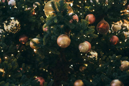 Christmas decorations on the Christmas tree. Celebrating Christmas, New Year and festive concept.の写真素材