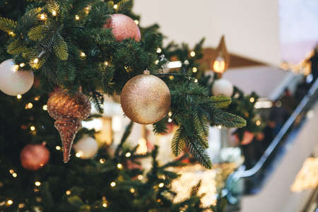 Christmas decorations on the Christmas tree. Celebrating Christmas, New Year and festive concept.の写真素材