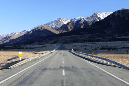 Scenic road through the Mount Cook National Park or Aoraki National Park on a beautiful winter dayの写真素材