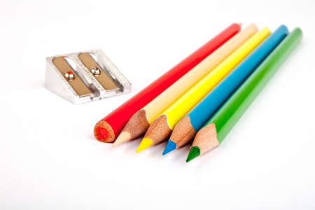 sharpened pencils and pencil shapener. isolated on white background.の写真素材