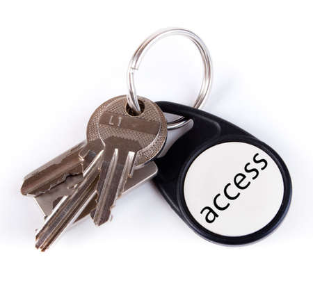 Three keys on keyring isolated over whiteの写真素材