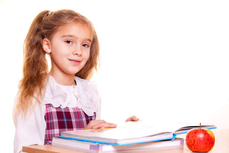 Little School Girl reading a book