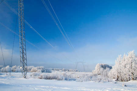 Winter high-voltage transmission towerの写真素材