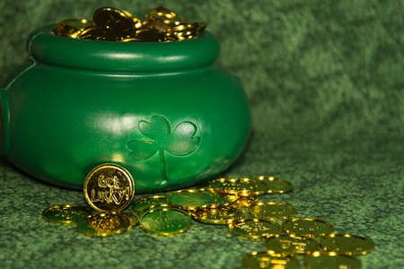 Irish Pot of Gold on green background