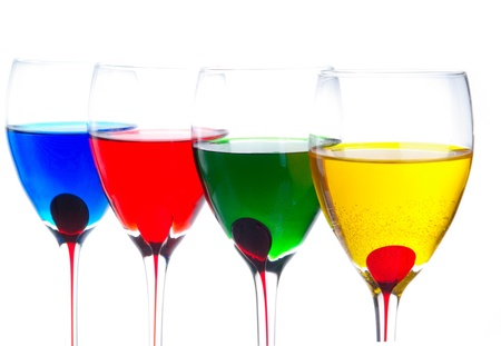 wine-glasses whith color beverages isolated ob white backgroundの写真素材