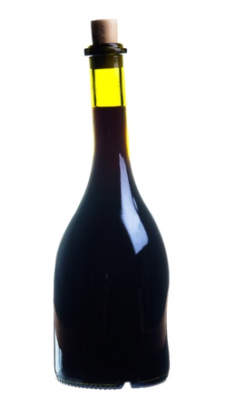 a bottle of dark red wine isolated on white backgroundの写真素材