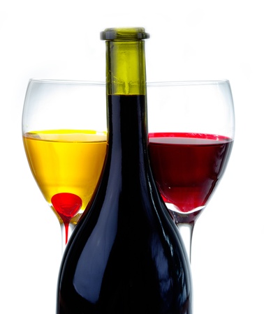 a bottle of wine and a wine-glass isolated on white backgroundの写真素材