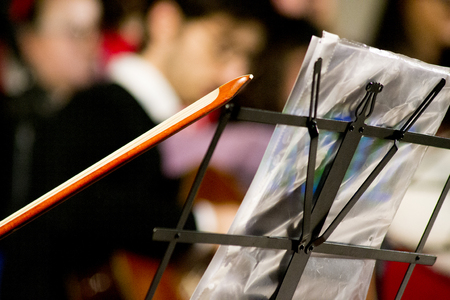 Classical music professional cello solo performance, hands up close, unrecognizable personの写真素材
