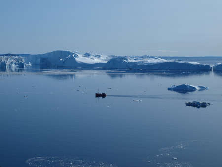Fishing boat in Ilulissat Icefjord, Greenland.