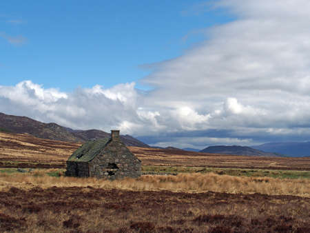 Ruined granite and slate building, Glen Banchor, Scotland in springの写真素材