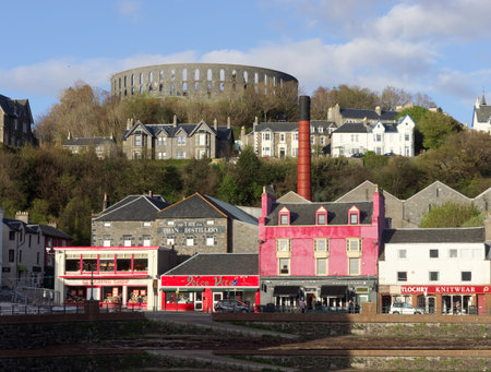 OBAN, SCOTLAND, MAY-07,2015, Battery hill with Oban distillery and McCaig's towerのeditorial素材