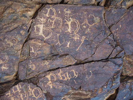 Ancient Rock paintings in the mountains for Mongolia. The paintings are thought to be approx 3000...