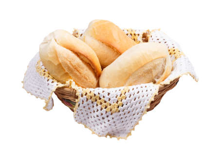 three breads in wicker basket isolated on white backgroundの写真素材
